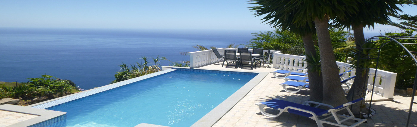 Blue-Ocean-Villa.-Blue-Sea,-Blue-Sky,-Blue-Pool